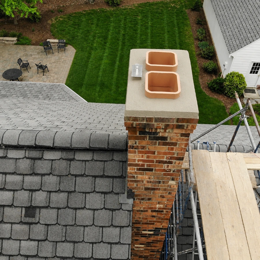 Repaired and sealed chimney crown and masonry after service in Highland Park, TX